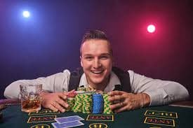 Dealer revealing community cards during Texas Hold'em flop